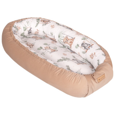 Snuggly baby nest + soft cushion Snuggly baby nest + soft cushion